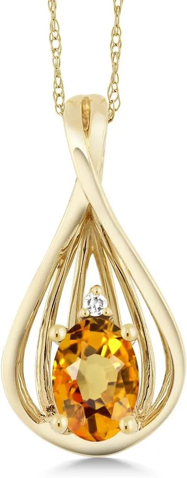 Gem Stone King 10K Yellow Gold Yellow Sapphire and White Diamond Teardrop Pendant Necklace For Women (0.55 Cttw, Gemstone September Birthstone, Oval 6X4MM, with 18 Inch Chain)