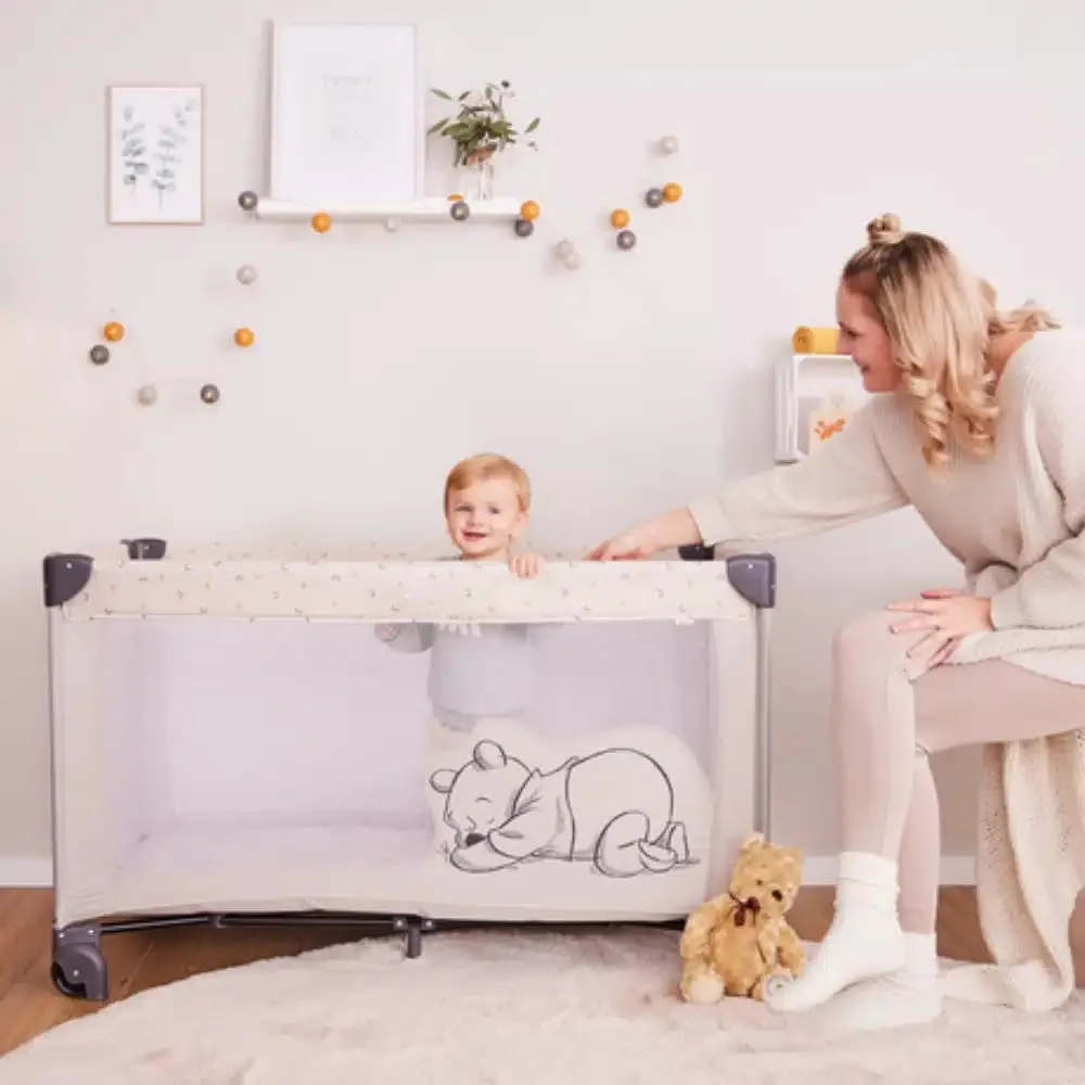 Hauck Dream N Play Go Travel Cot – Pooh Rainbow Beige